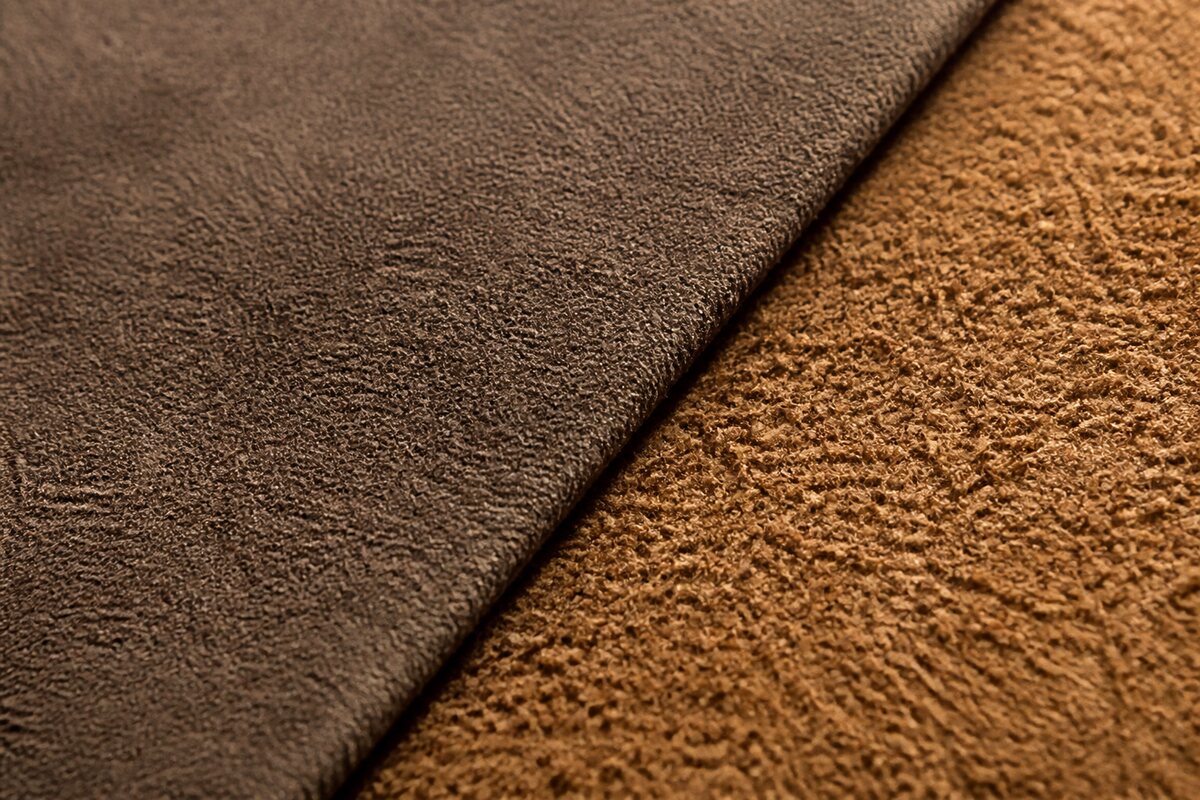 Macro comparison of a fine nubuck nap and a longer suede fiber surface